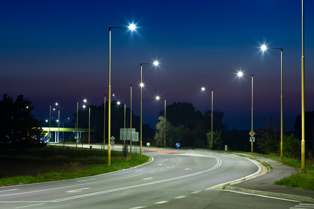 Completed road lighting and electrical infrastructure at night