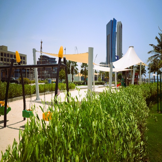 Maintained public park with planting and recreation facilities